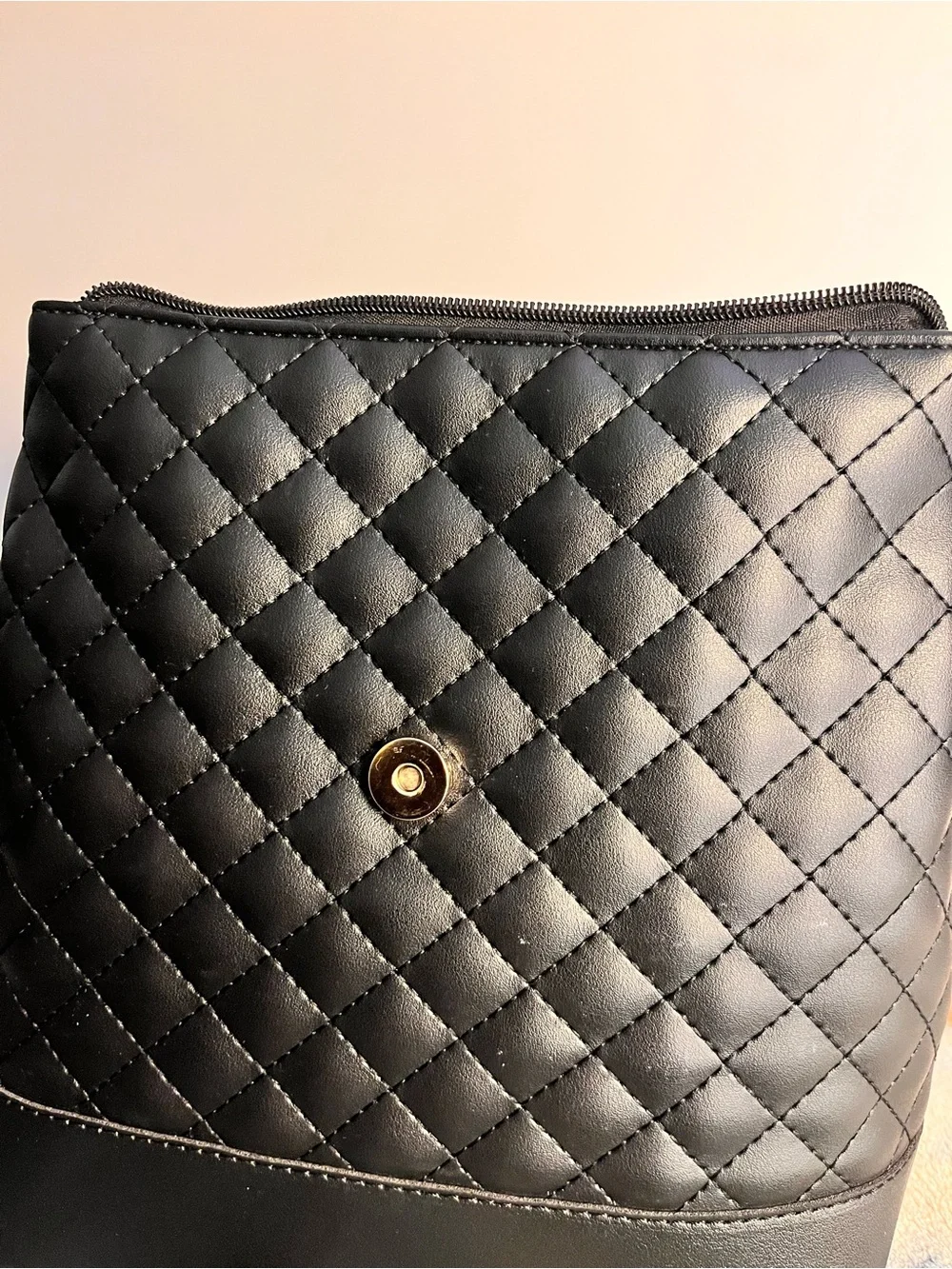 Black Quilted Backpack with Gold Charm